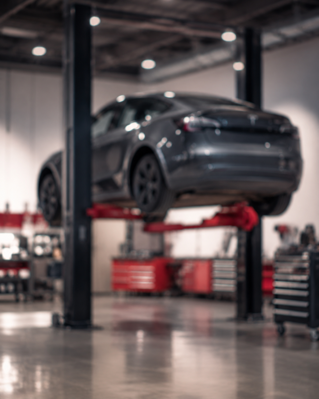 Vehicle on a lift in a repair shop
